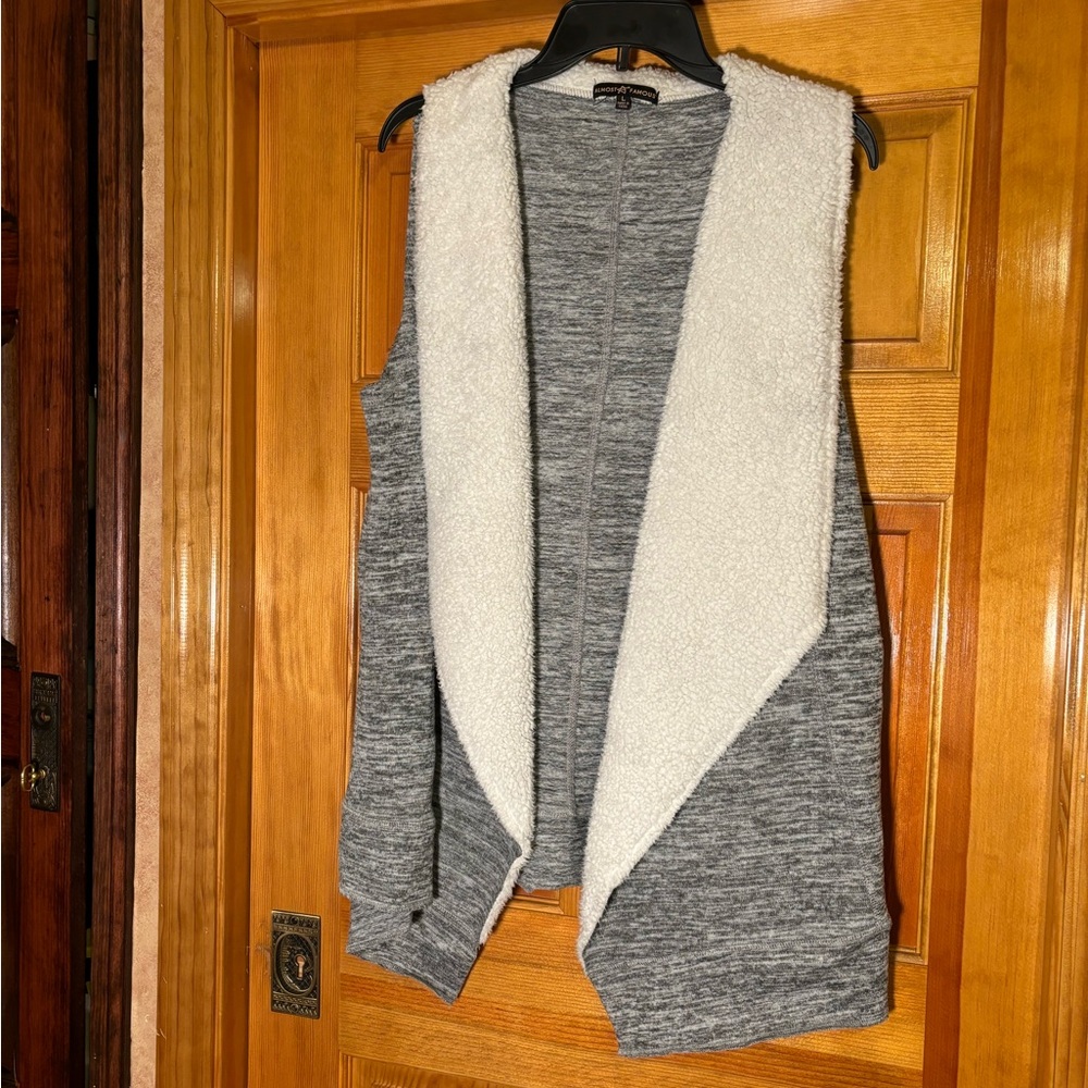 Almost famous heathered gray vest lined with white Sherpa lapel